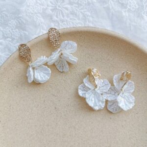 Christi Tasker Miami Coral Reef Venetian Glass Designer Earrings 49536d15-e7b1-5459-8c7f-27e1c5dd7ee7.jpg Beautifully handmade and handblown, these Coral Reef Venetian Glass Earrings are super lightweight and detailed. Each of the coral fans has movement yet they are delicate and light. Glass Designer Earrings, Coral Reef Venetian Glass Designer Earrings, fashion, miami