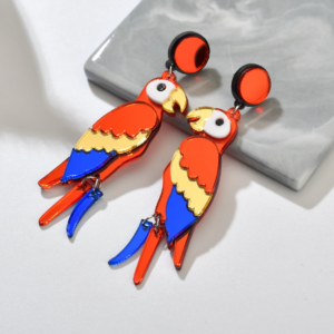 Christi Tasker Miami Osgood Art Deco Red Acrylic Macaw Parrot Earrings 8d5e364d-100e-5153-8bd4-08d1629ea3a1.png My fabulously lightweight acrylic macaw parrot earrings are the talk of the town. No! The birds don't talk but people certainly do talk about them. Seriously! These babes are street stoppers. The bottom two feathers flow and move to give a little dangling movement. People will stop and ask where you've gotten them. Macaw Parrot Earrings, Art Deco Red Acrylic Macaw Parrot Earrings, Drop Earrings, Fashion Earrings