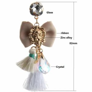 Passementarie Bow Tie Lion's Head Tassel Earrings (Light Cream/Yellow, Brown Leopard & Blush Pink) c782604d-03b1-509d-b968-6e01d5133786.jpg Combining my favorite components of scraps dictate my passementerie earring designs. Each bow is delicately tied with a lions head and dangling tassels, stones, & threads. Lightweight and comfortable to wear, my passementerie roaring lions earrings are a compliment waiting to happen.