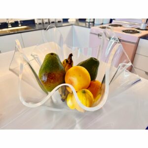Vintage Mid-Century Modern Acrylic Lucite Bowl 2e179078-bc2d-5bbb-8403-11038978f375.jpg This beautiful lucite bowl is made of hand-formed clear acrylic that is 1/8" thick. It is made in what is known as a handkerchief design. Bowl
