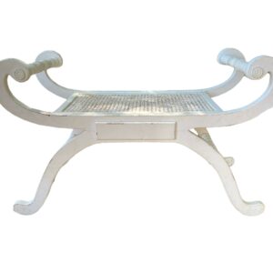 Vintage French Regency Neoclassical Style Cane Seat Curule X-Frame Stool 504208d4-f396-509b-bb7a-37b789a47886-1.jpg This is a beautiful 1960s Curule Style X-frame bench in the Neoclassical style with a cane seat. This unique bench features a cream distressed painted finish, cane seat, shapely scrolling form, solid wood frame, and great style and form, circa 1960. Vintage,french regency