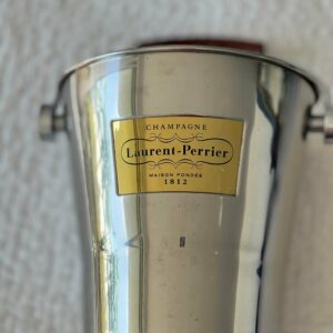 Large Vintage French Laurent Perrier Champagne Bucket With Raised Brass Nameplate Stainless large-vintage-french-laurent-perrier-champagne-bucket-with-raised-brass-nameplate-stainless-3177 This is a beautiful Vintage Laurent Perrier Champagne Bucket. It is perfect for a Wedding gift or summer table decor. A Wine bucket with a brass Laurent Perrier French Champagne Ice bucket is a must addition to your Barware and Bar accessories.